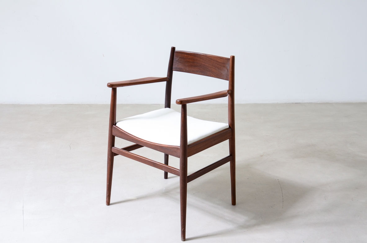 Rare set of 8 armchairs in shaped teak. Manufacture L. Jacobsen, ca. 1960.