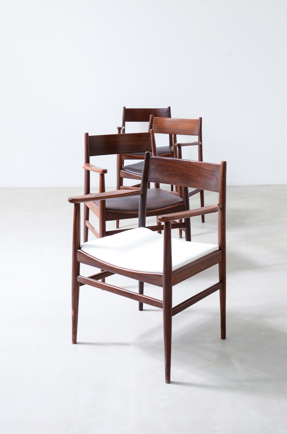 Rare set of 8 armchairs in shaped teak. Manufacture L. Jacobsen, ca. 1960.