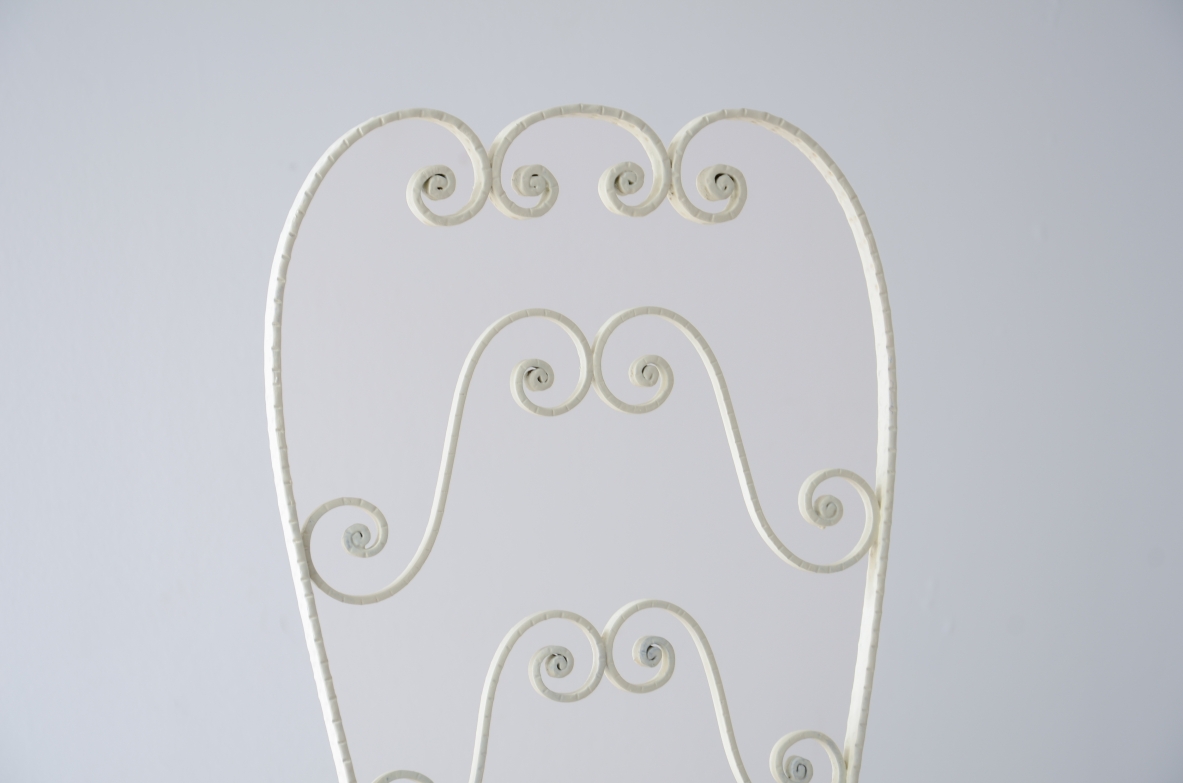Pierluigi Colli 1950's Two wrought iron chairs with high backs decorated with curls