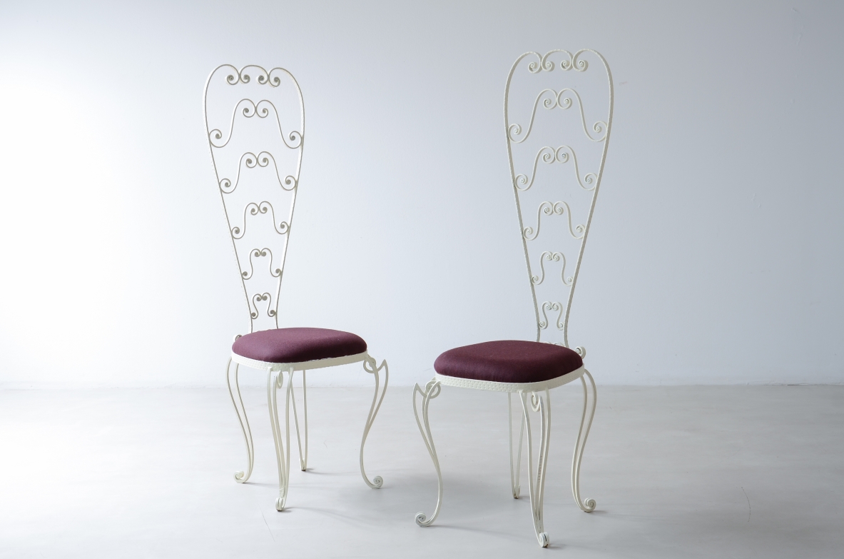 Pierluigi Colli 1950's Two wrought iron chairs with high backs decorated with curls