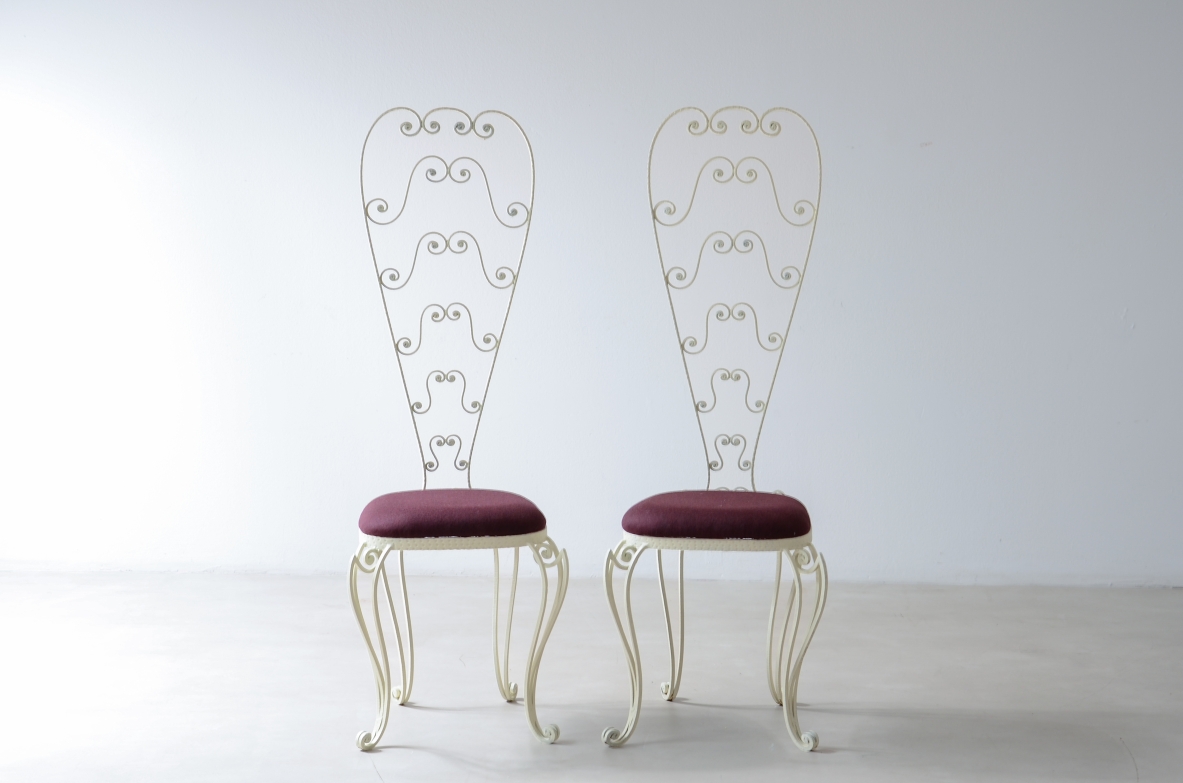 Pierluigi Colli 1950's Two wrought iron chairs with high backs decorated with curls