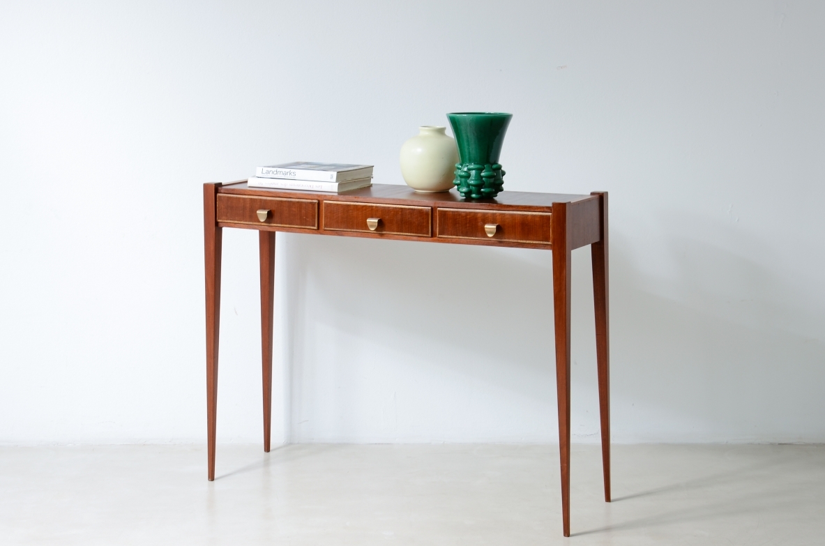 Elegant console table with three drawers on the front. talian manufacture, ca. 1955.