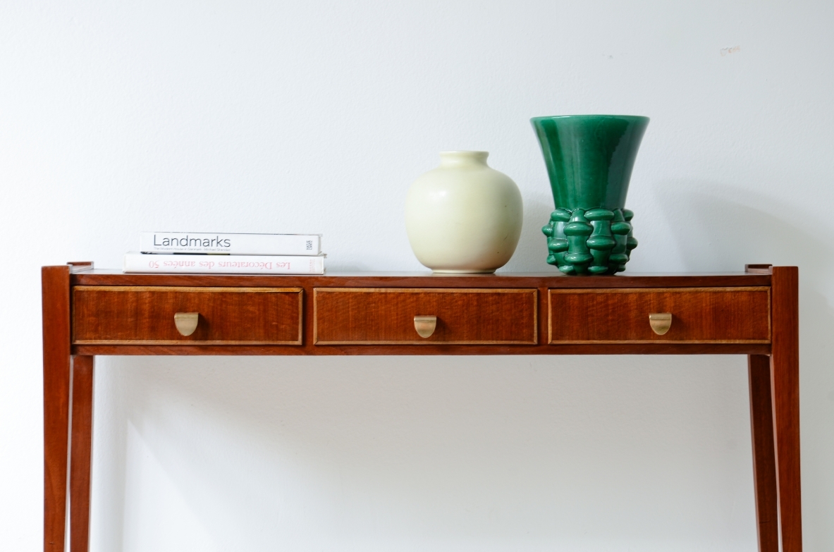 Elegant console table with three drawers on the front. talian manufacture, ca. 1955.