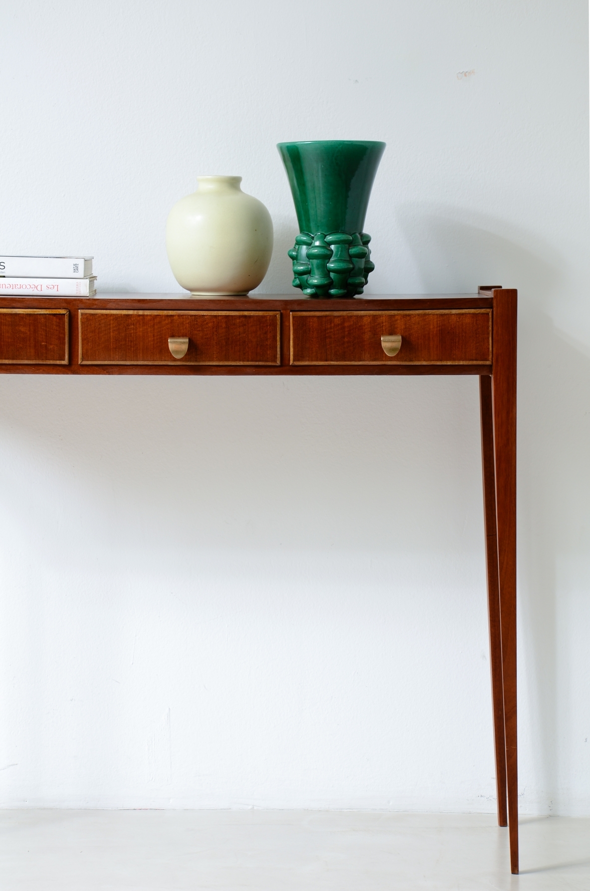Elegant console table with three drawers on the front. talian manufacture, ca. 1955.