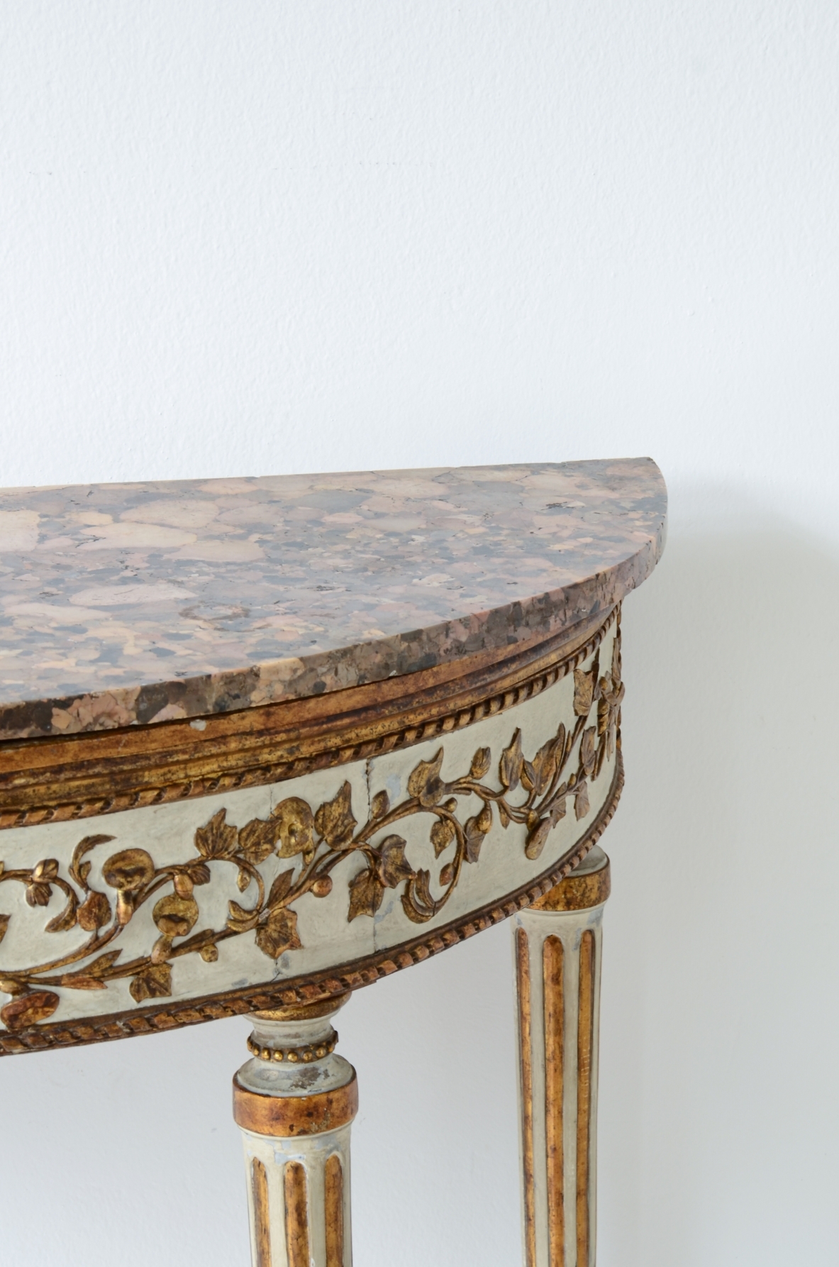 Splendid half-moon console table in lacquered and gilded wood. Made in Naples, ca. 1780-1790.