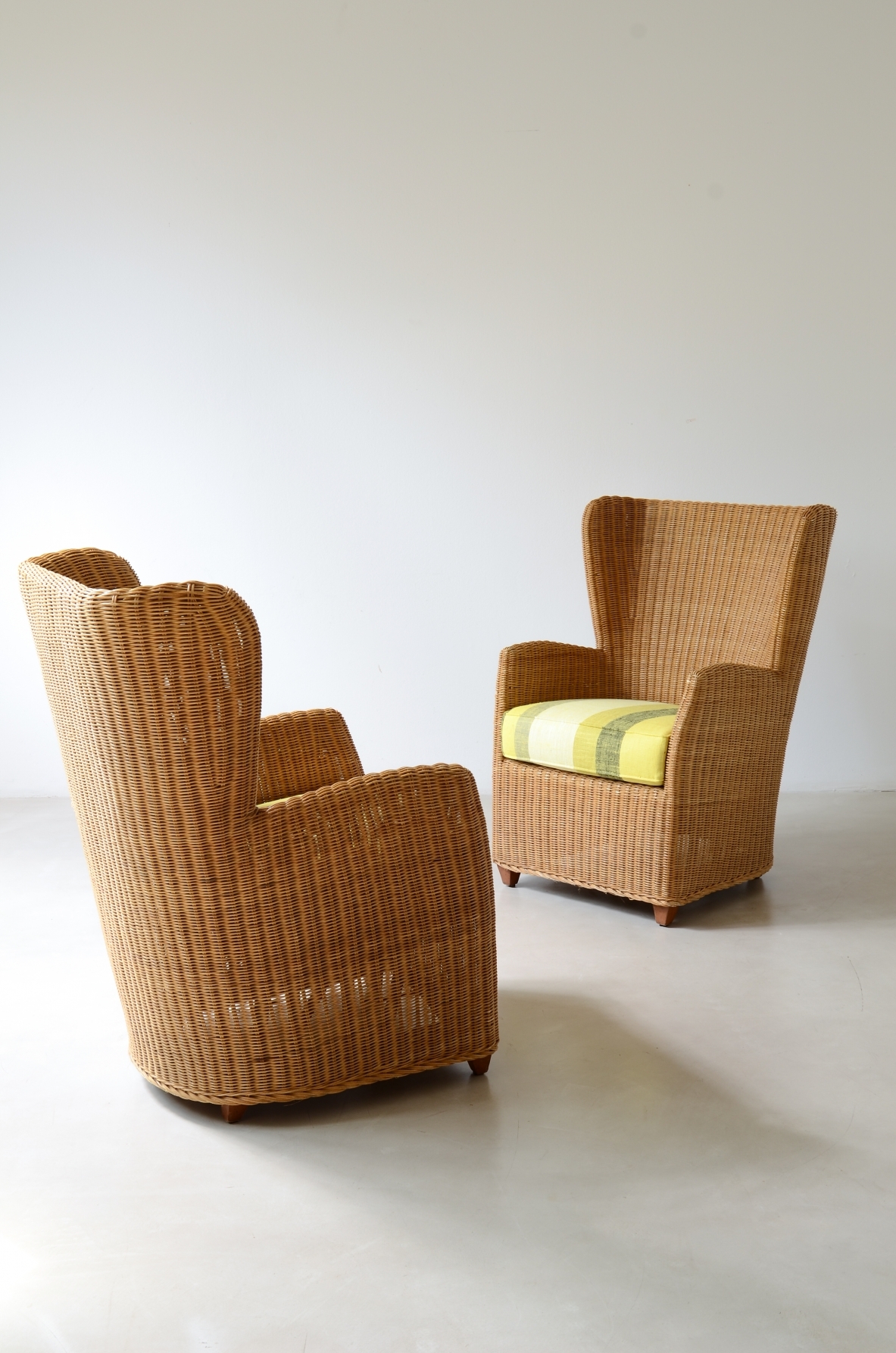 Two large woven rattan armchairs. Italian manufacture, circa 1960.
