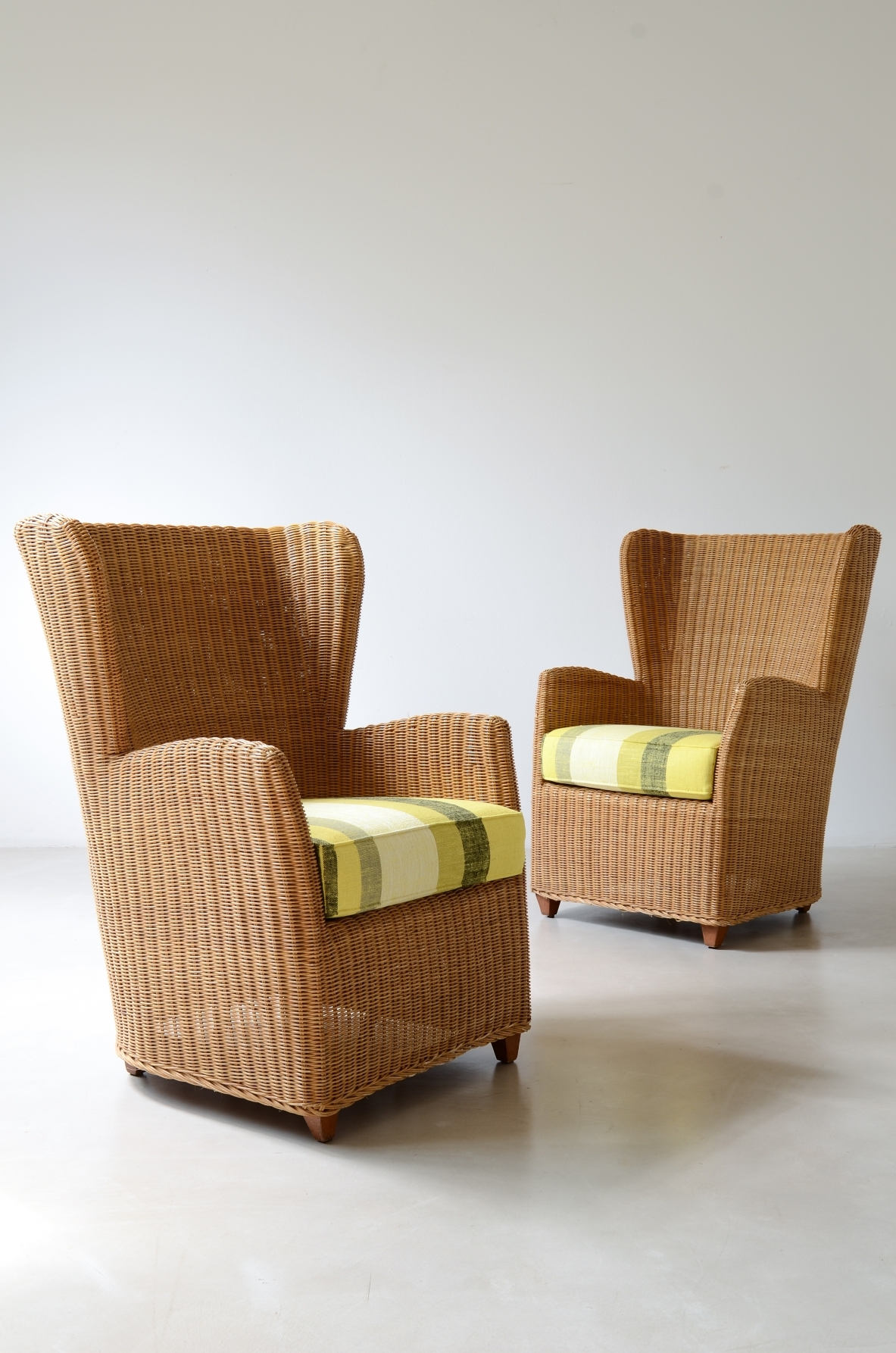 Two large woven rattan armchairs. Italian manufacture, circa 1960.