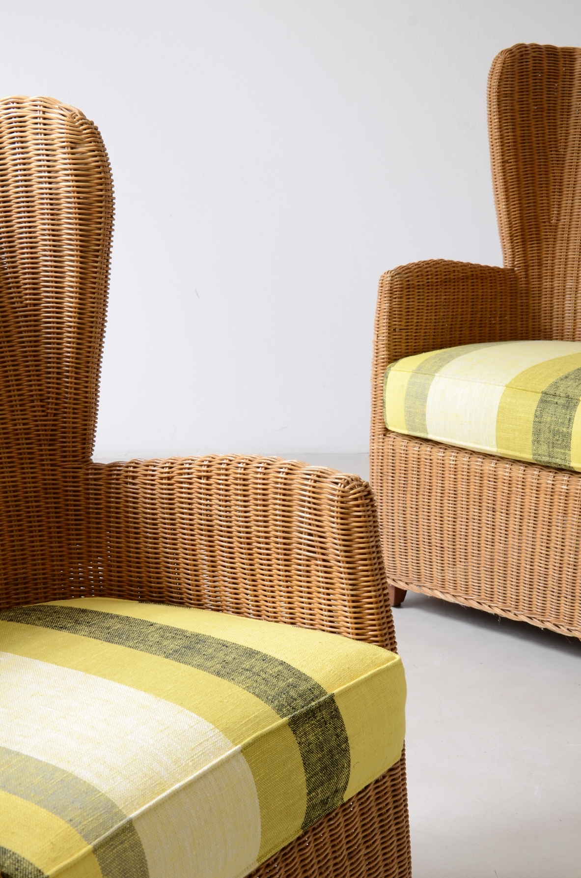 Two large woven rattan armchairs. Italian manufacture, circa 1960.