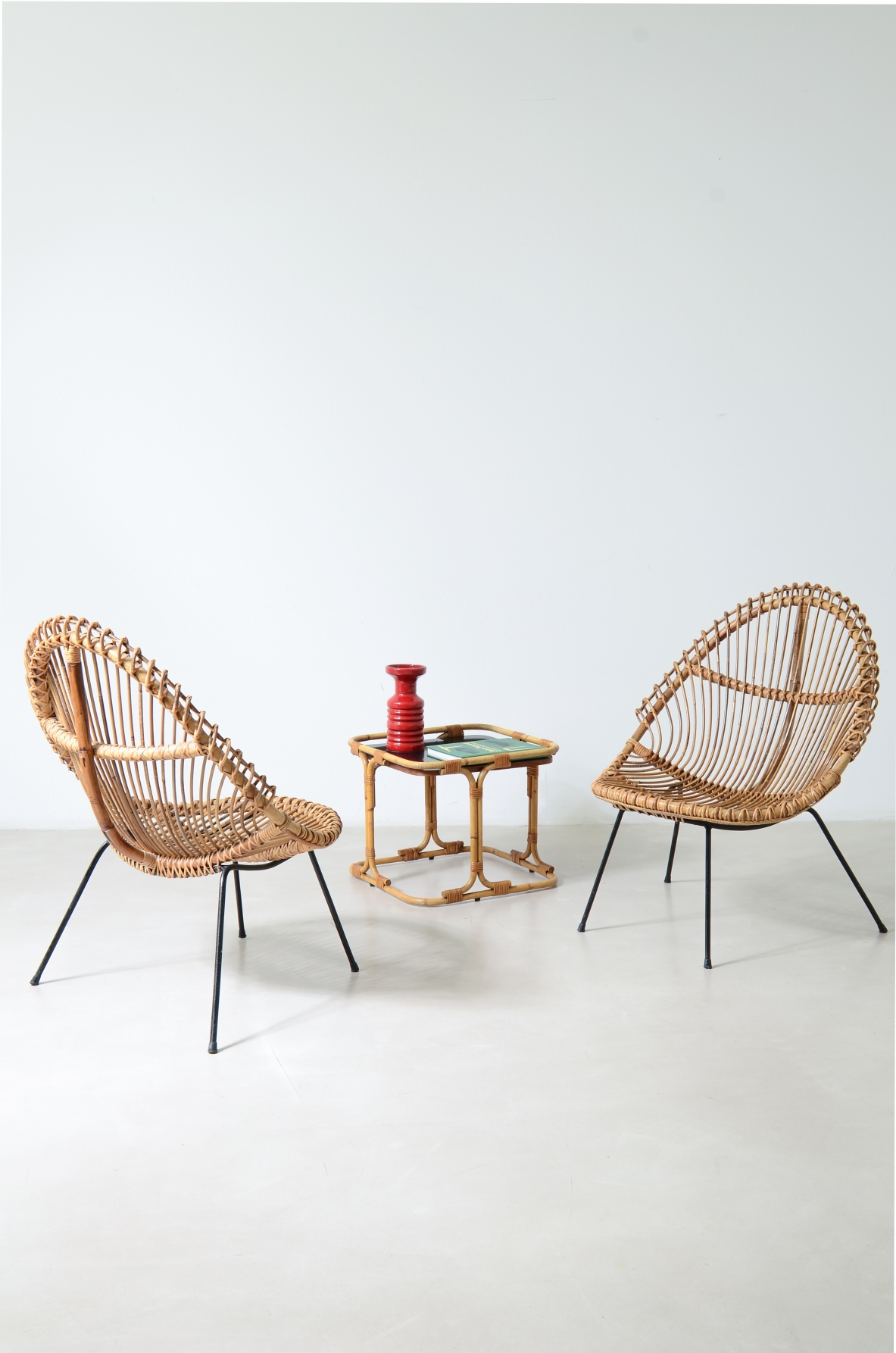 Pair of nice curved rattan chairs with metal legs, Italy1950's.