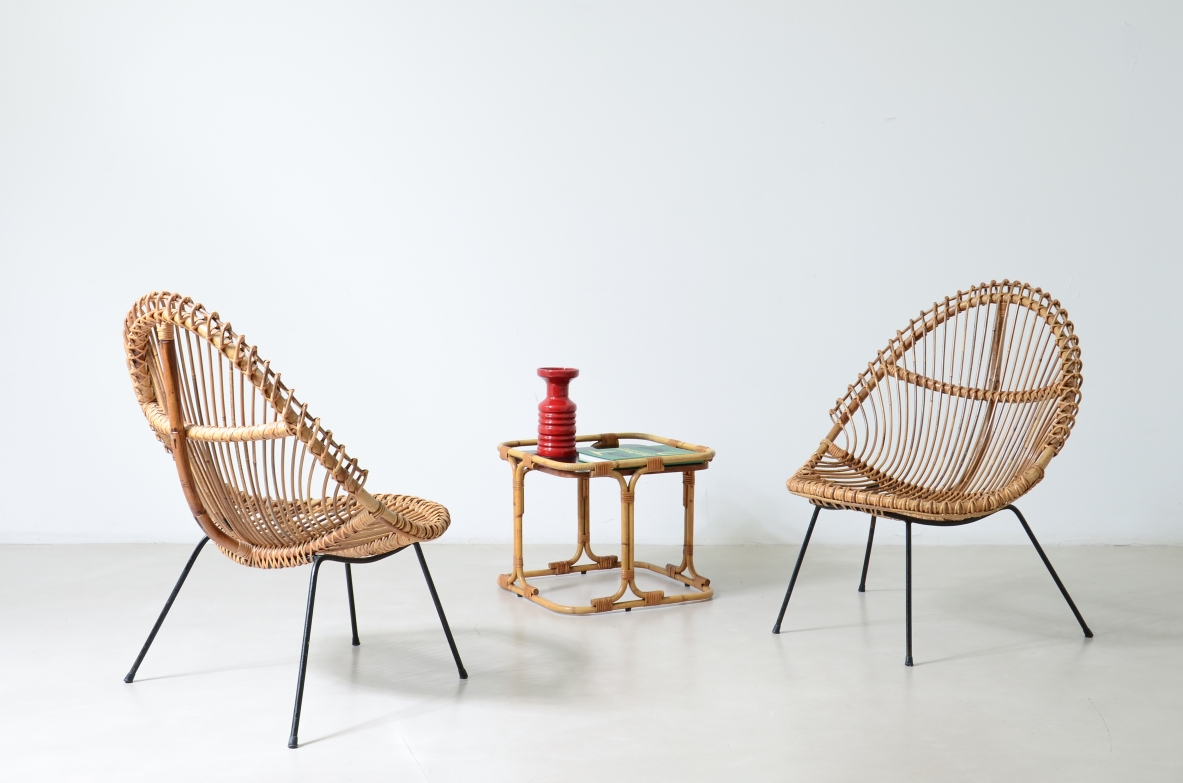 Pair of nice curved rattan chairs with metal legs, Italy1950's.