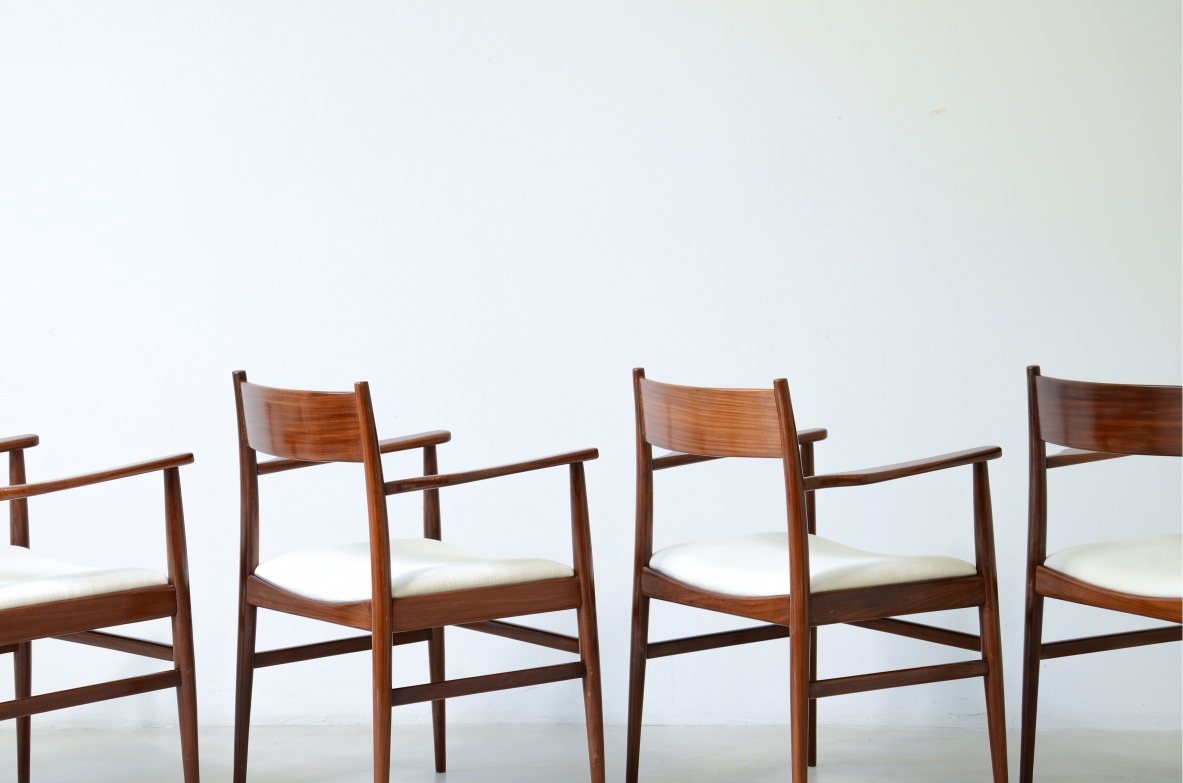 Rare set of 8 armchairs in shaped teak. Manufacture L. Jacobsen, ca. 1960.