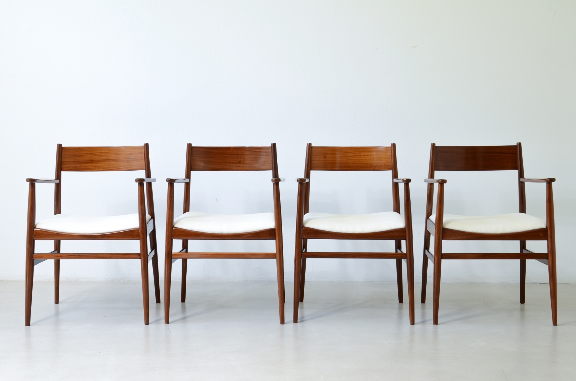 Rare set of 8 armchairs in shaped teak. Manufacture L. Jacobsen, ca. 1960.