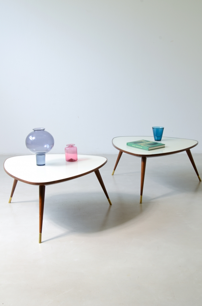 Pair of side tables based on Osvaldo Borsani's 1954 design, with beveled glass tops, tapered legs and brass feet, re-edition by Officina Antiquaria.