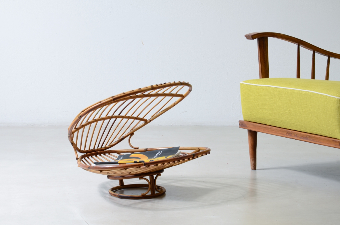 shell-shaped magazine rack made of curved reed.  Bonacina manufacture, circa 1960s.