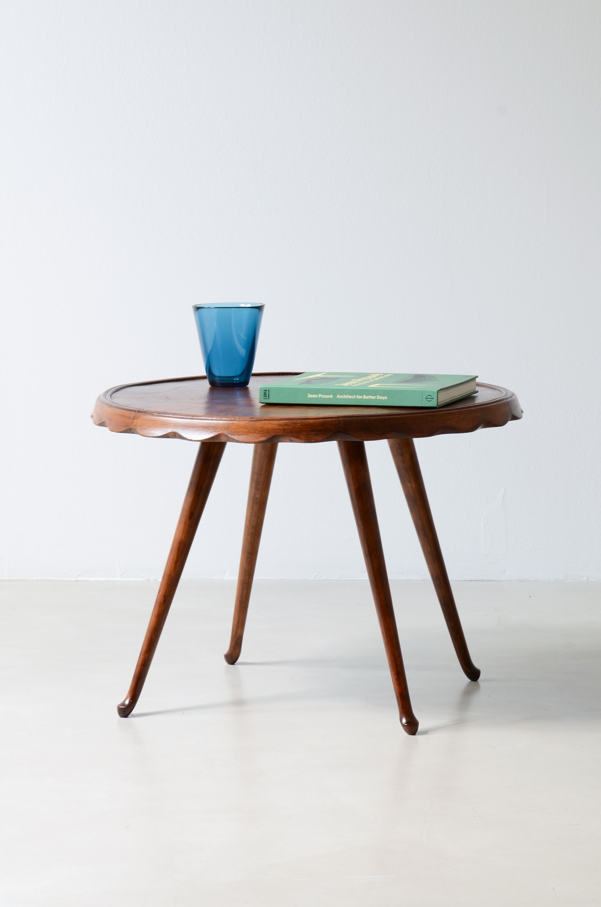Paolo Buffa  Elm wood coffee table with a wave-shaped top. Serafino Arrighi Manufactory, ca. 1950.