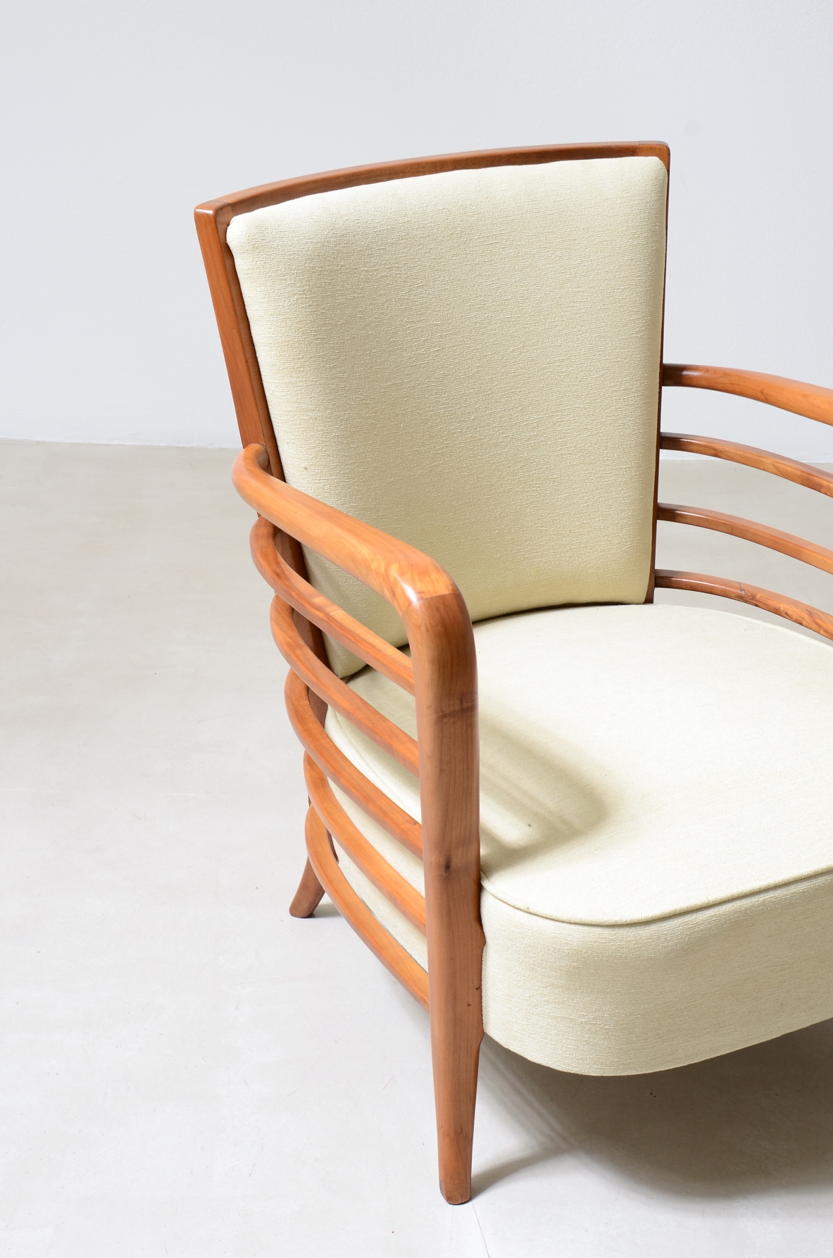 Pair of shaped cherrywood armchairs. Attribution: Paolo Buffa, ca. 1940.