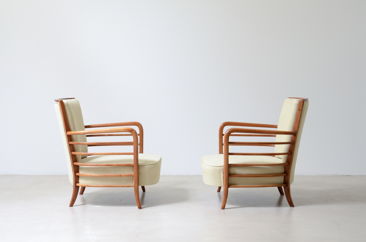Pair of shaped cherrywood armchairs. Attribution: Paolo Buffa, ca. 1940.