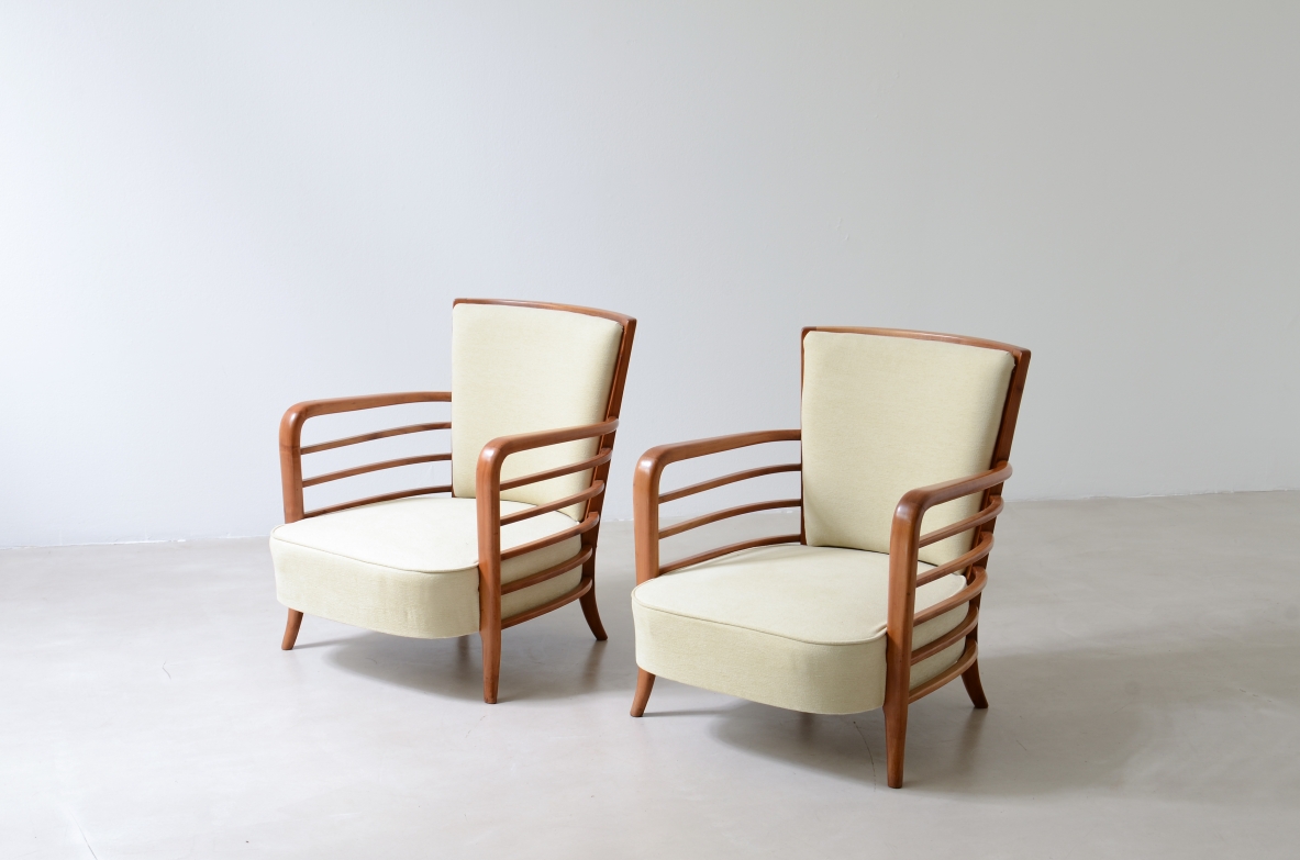 Pair of shaped cherrywood armchairs. Attribution: Paolo Buffa, ca. 1940.