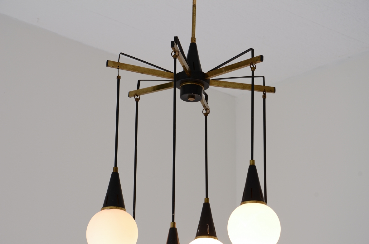 Six-light chandelier with brass arms and opal glass spheres 