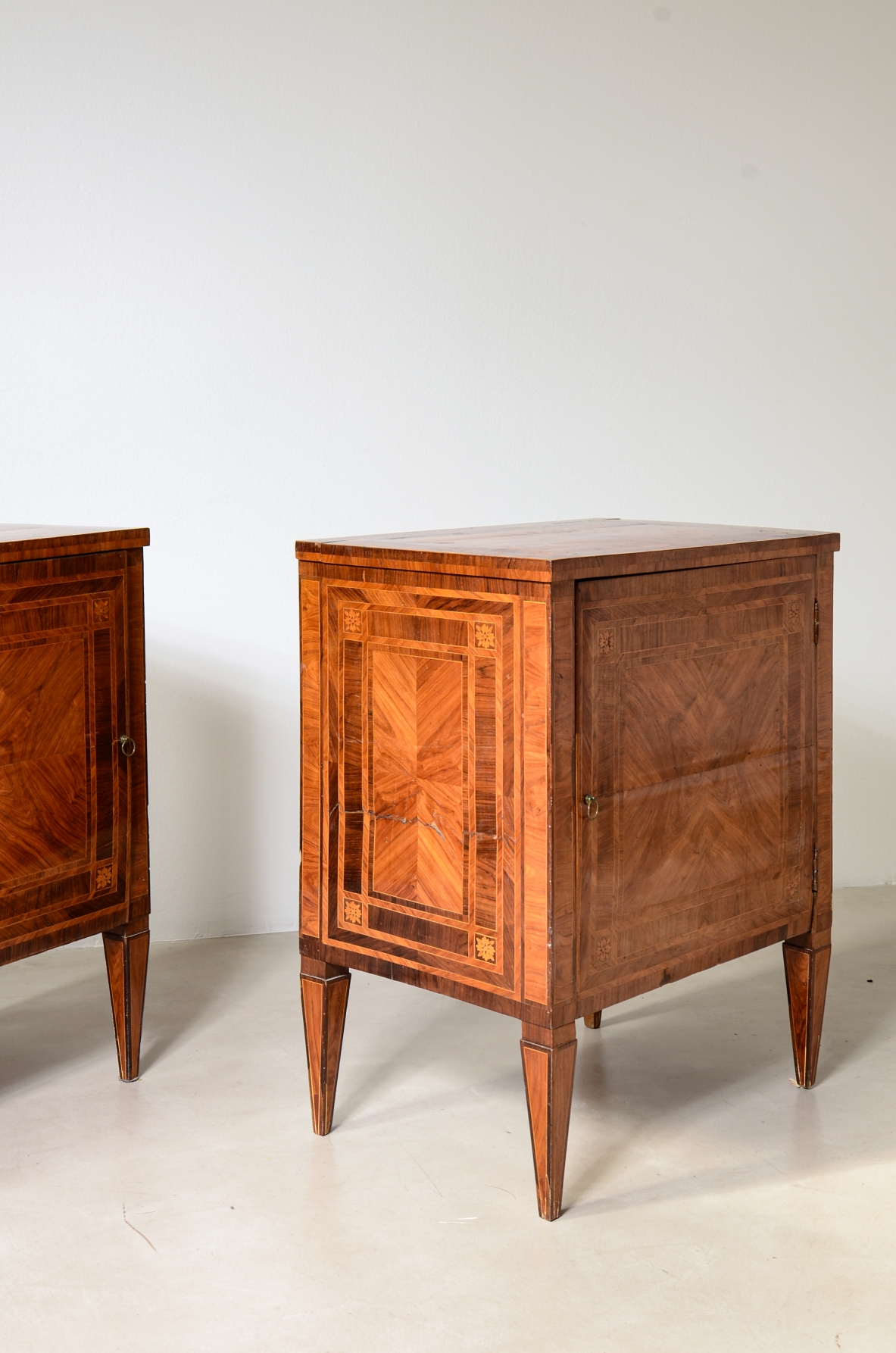 Pair of elegant small cabinets, Italian manufacture, inlaid with fine woods. Louis XVI period, circa 1780–90.