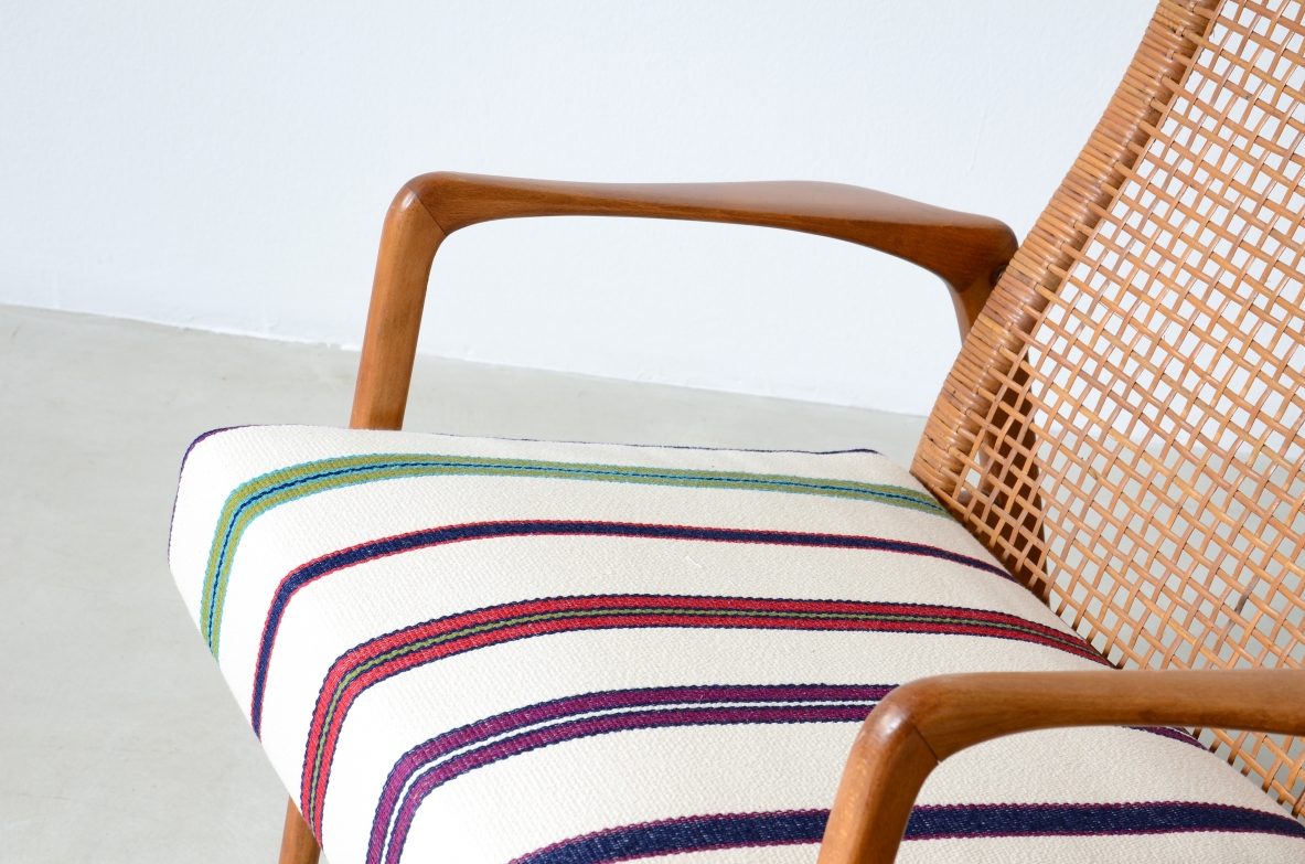 Pair of small armchairs in shaped wood, Scandinavian manufacture, circa 1960.