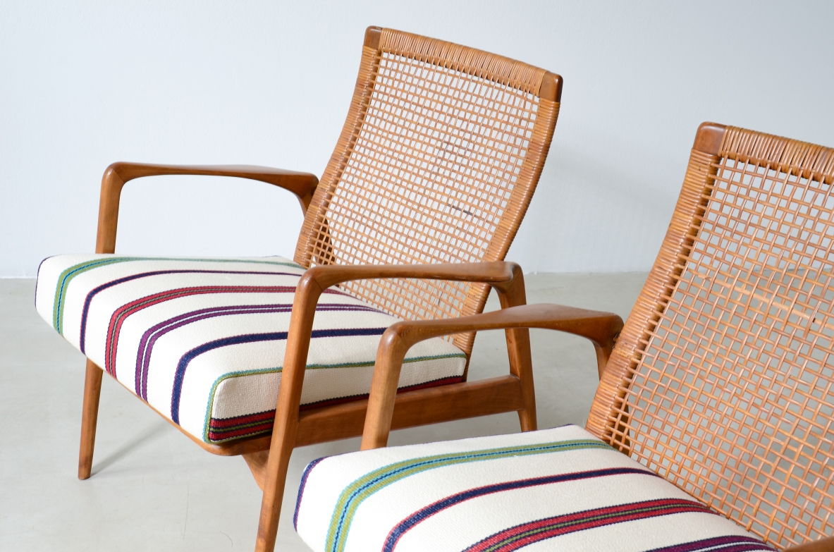 Pair of small armchairs in shaped wood, Scandinavian manufacture, circa 1960.