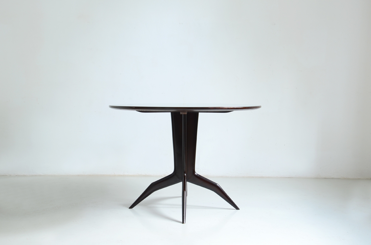 Elegant 1950s round table in ebonized wood and opaline glass