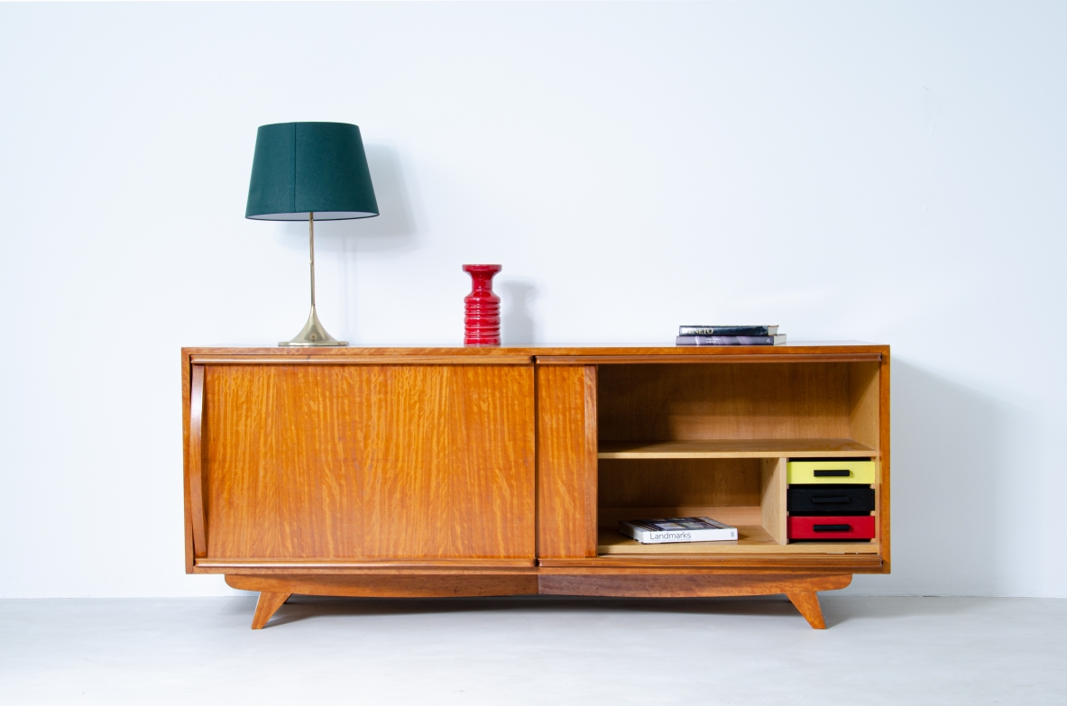Sideboard in light wood with two sliding doors and very nice handles, drawers and shelves inside. Scandinavia 1960's.