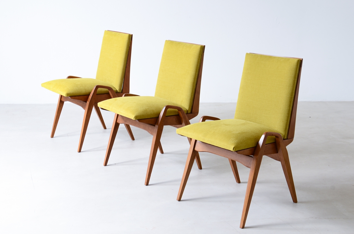 Maurice Prè, set of eight 1950's chairs in light wood and fabric upholstery