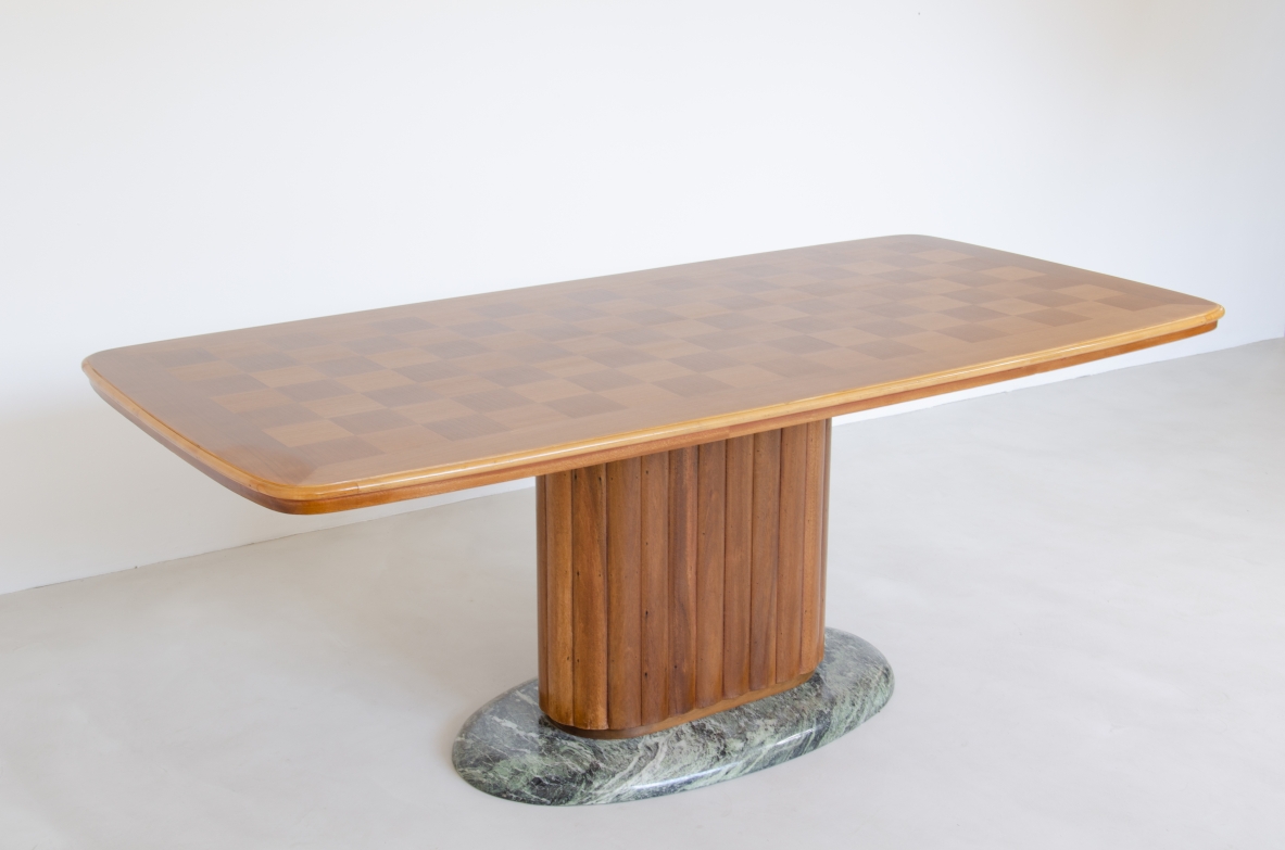 Large rectangular table by Vittorio Dassi for Dassi Torino, with a rounded-corner top and wooden edging, fluted cherrywood central pedestal and oval Verde Alpi marble base.