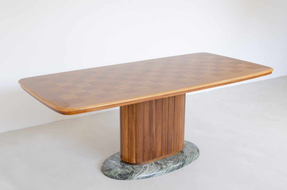 Vittorio Dassi, unique 1940's dining table with a very nice mahogany oval column and green "Verde Alpi"marble base. Splendid top with geometrical inlays in maple wood.