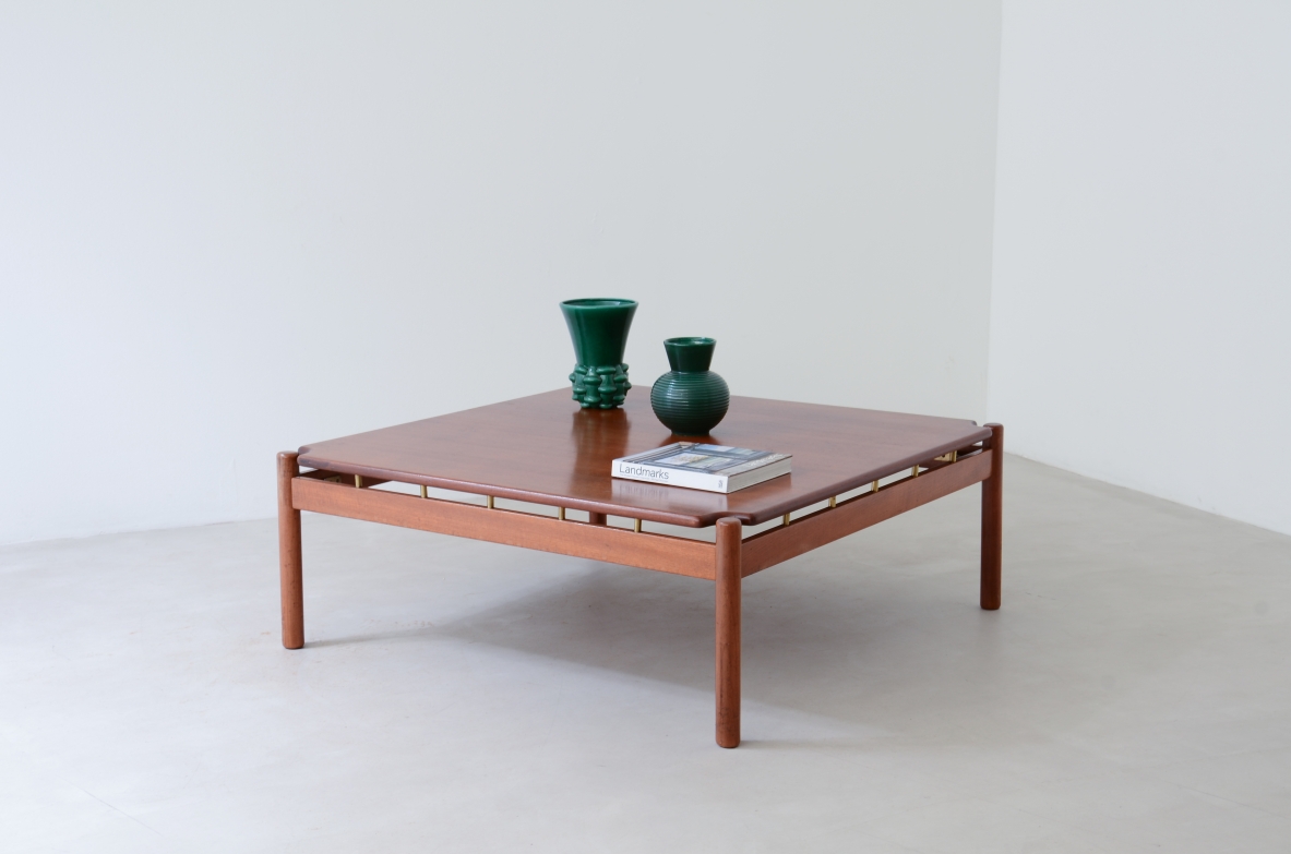 Ilmari Tapiovaara, low table in teak wood and brass details. Production by La Permanente Mobili, Cantù, 1957.
