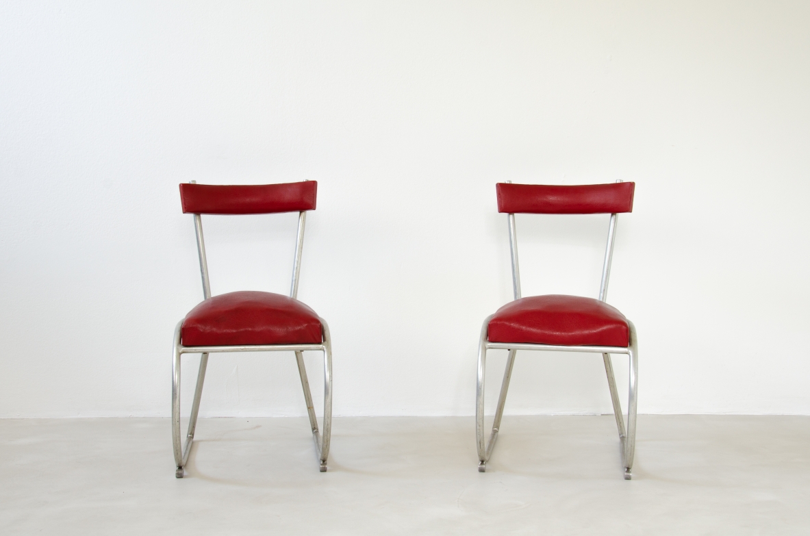 Pair of Italian1930's chairs made of curved metal and seat and back with original upholstery.Prod.Cova Milano.