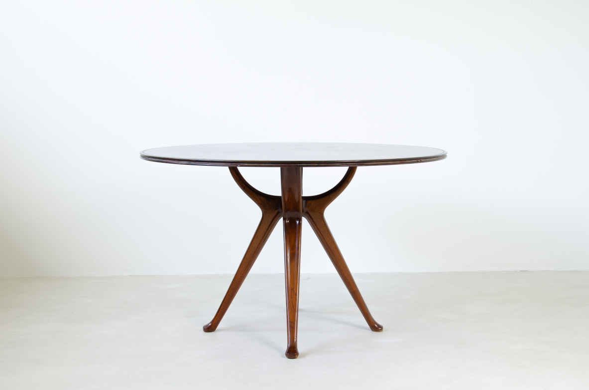 Osvaldo Borsani, splendid round table with extensions, specially produced on commission for a private residence in Milan, 1940's.