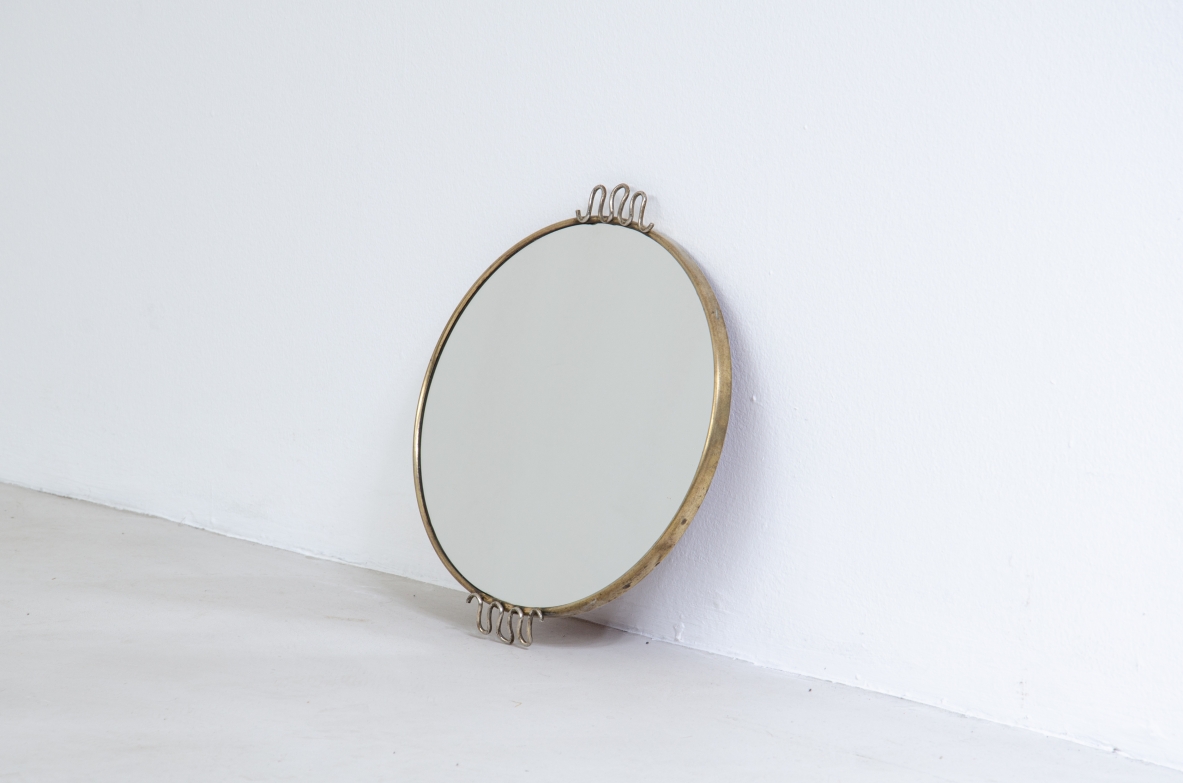 Osvaldo Borsani, round mirror with brass frame.  Italy, 1950s.