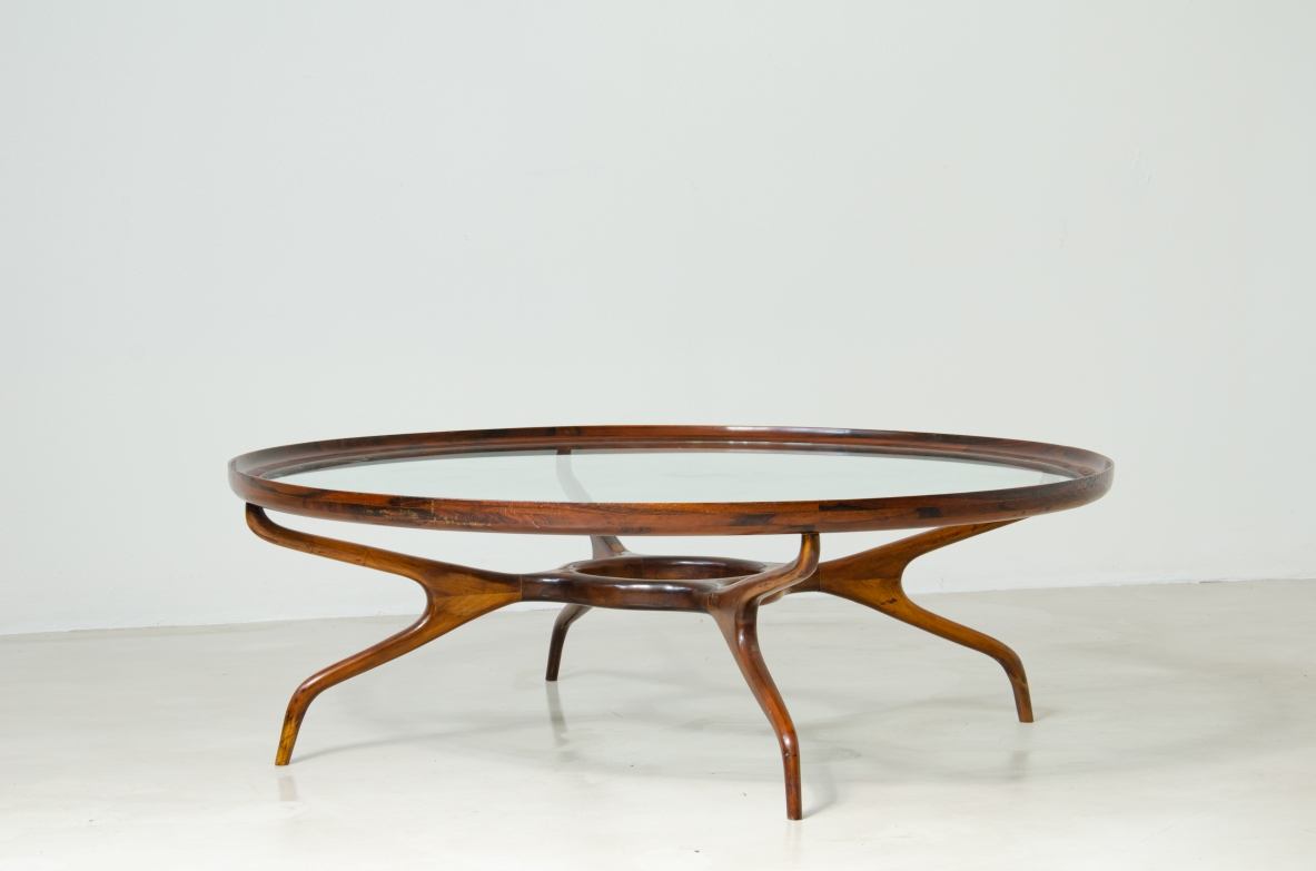 Giuseppe Scapinelli, grande tavolino con struttura di forma organica in palissandro e piano in cristallo, 1960ca.