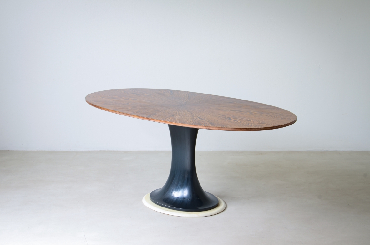 Very elegant oval table with turned base in petrol blue lacquered wood and marble disc.  Palm wood veneer top.  Turin School, 1960's.