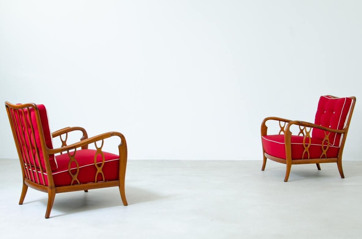Pair of cherry wood armchairs with ribbon motif on the sides. Seat and back in padded fabric.  Attribution Paolo Buffa 1930s.