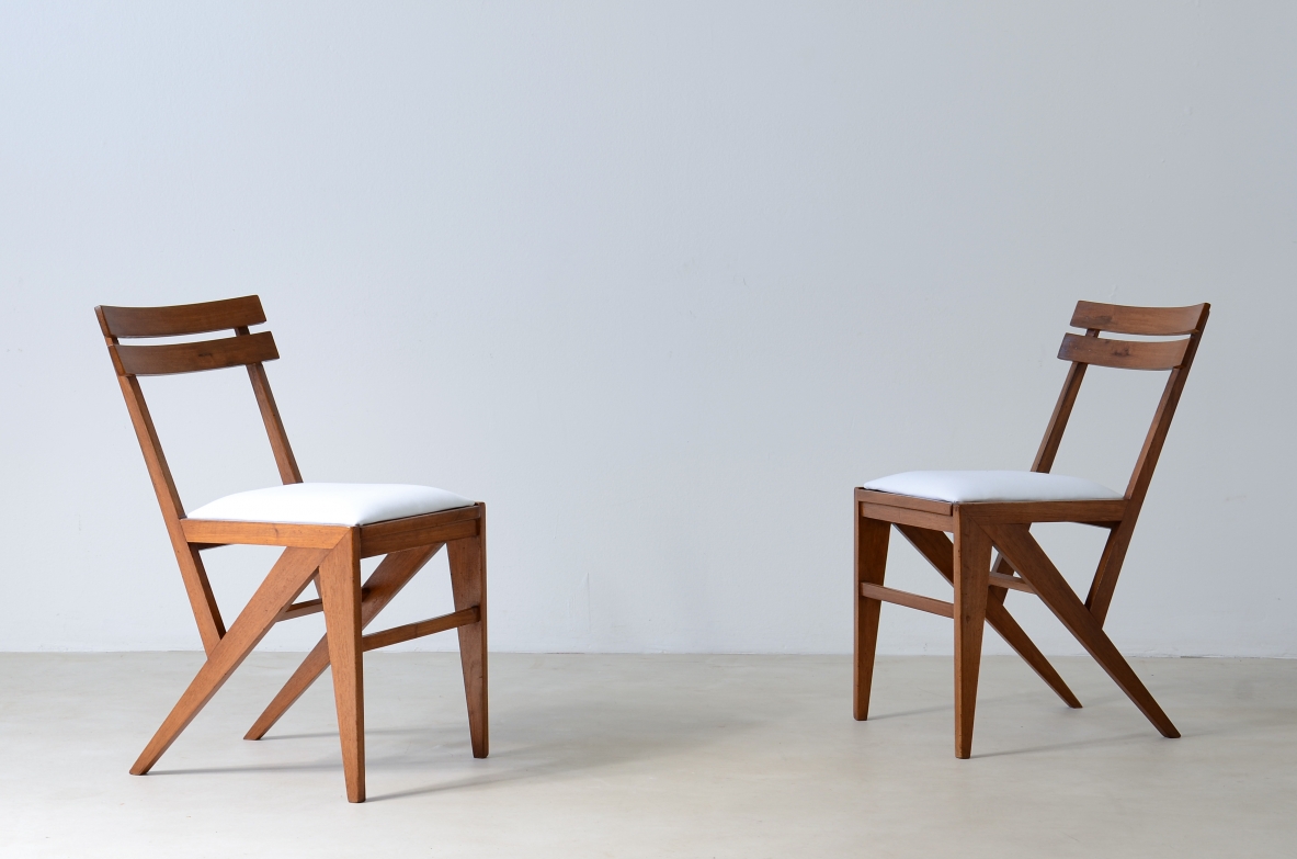 Pair of modernist wooden chairs.  Italian manufacture, 1950s.