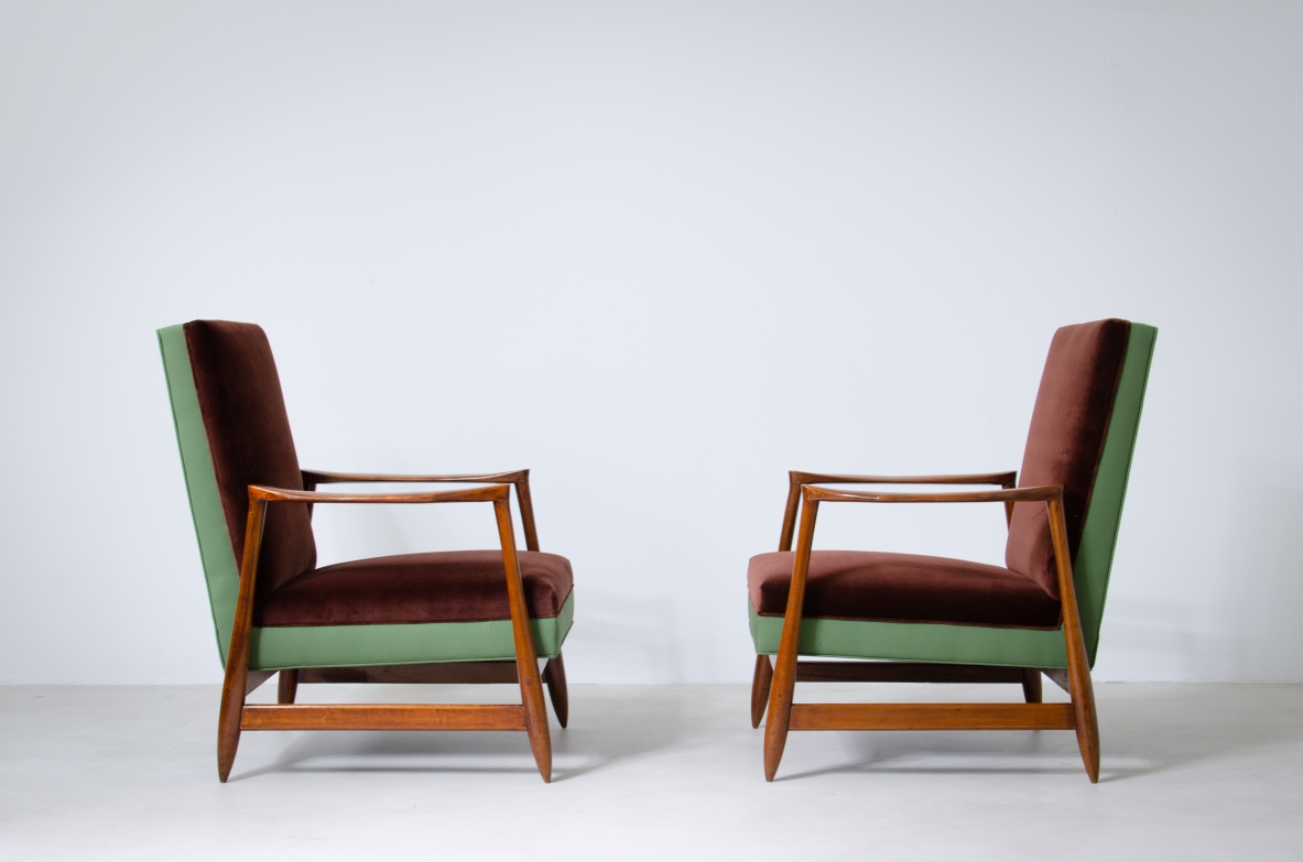 Pair of elegant armchairs with wooden structure and upholstered fabric.  Italian manufacture, 1960's.