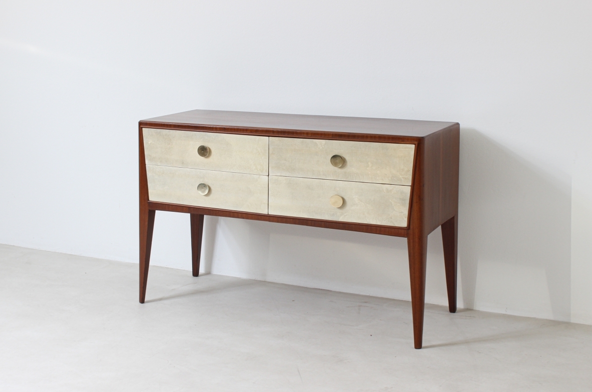 Chest of drawers in walnut with nice long and thin legs and brass handles.  Attributed to Paolo Buffa, 1950's.