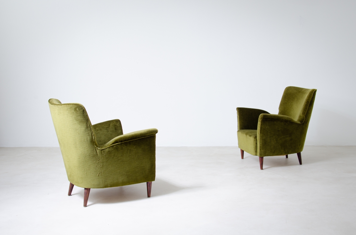 Pair of mid century modern armchairs upholstered in velvet.  1950's Italian manufacture.