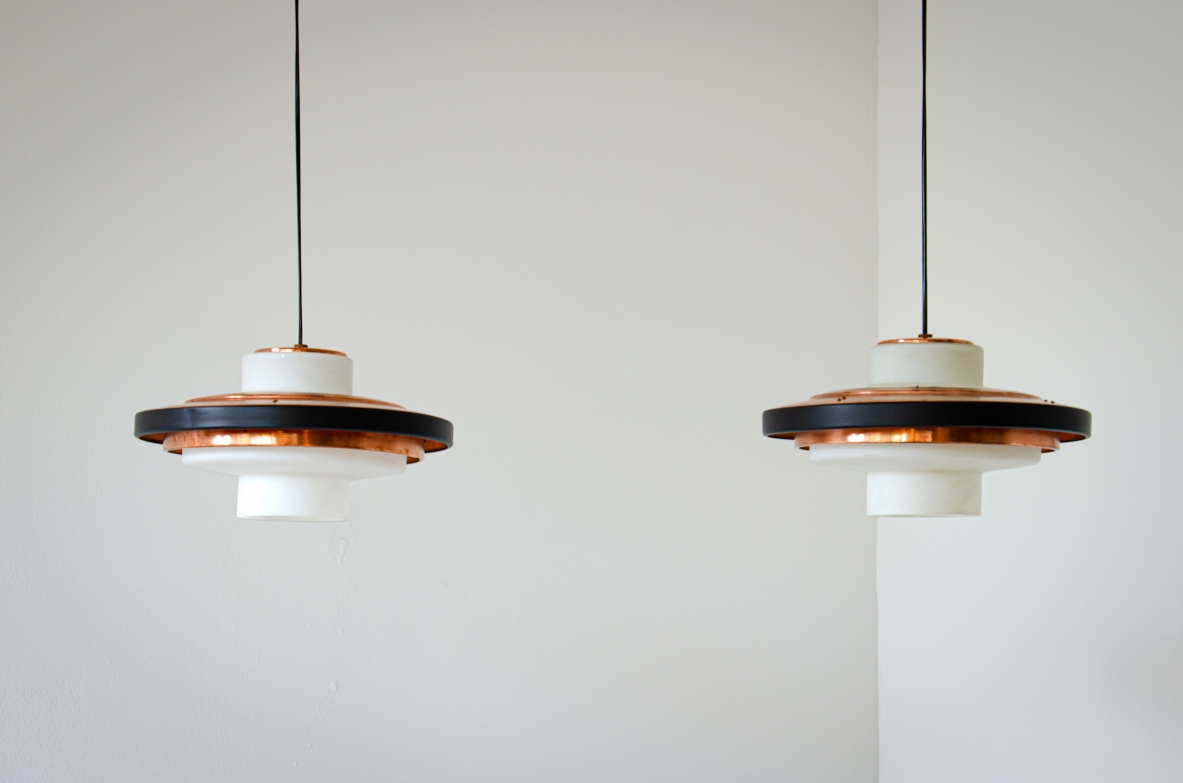 Rare pair of opaline glass chandeliers and copper disc. Stilnovo, 1960's.
