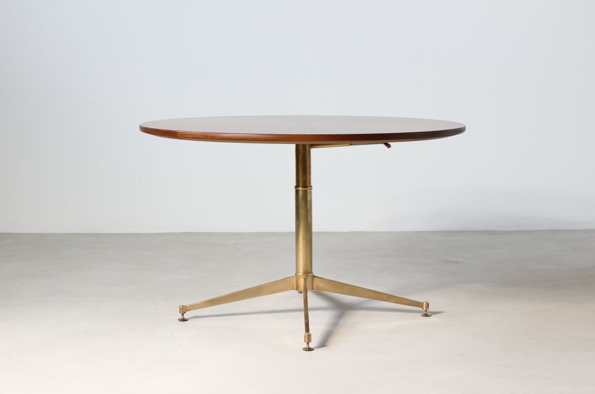 Unique table with up and down mechanism, brass base and walnut wood top. Italian manufacture, 1950's.