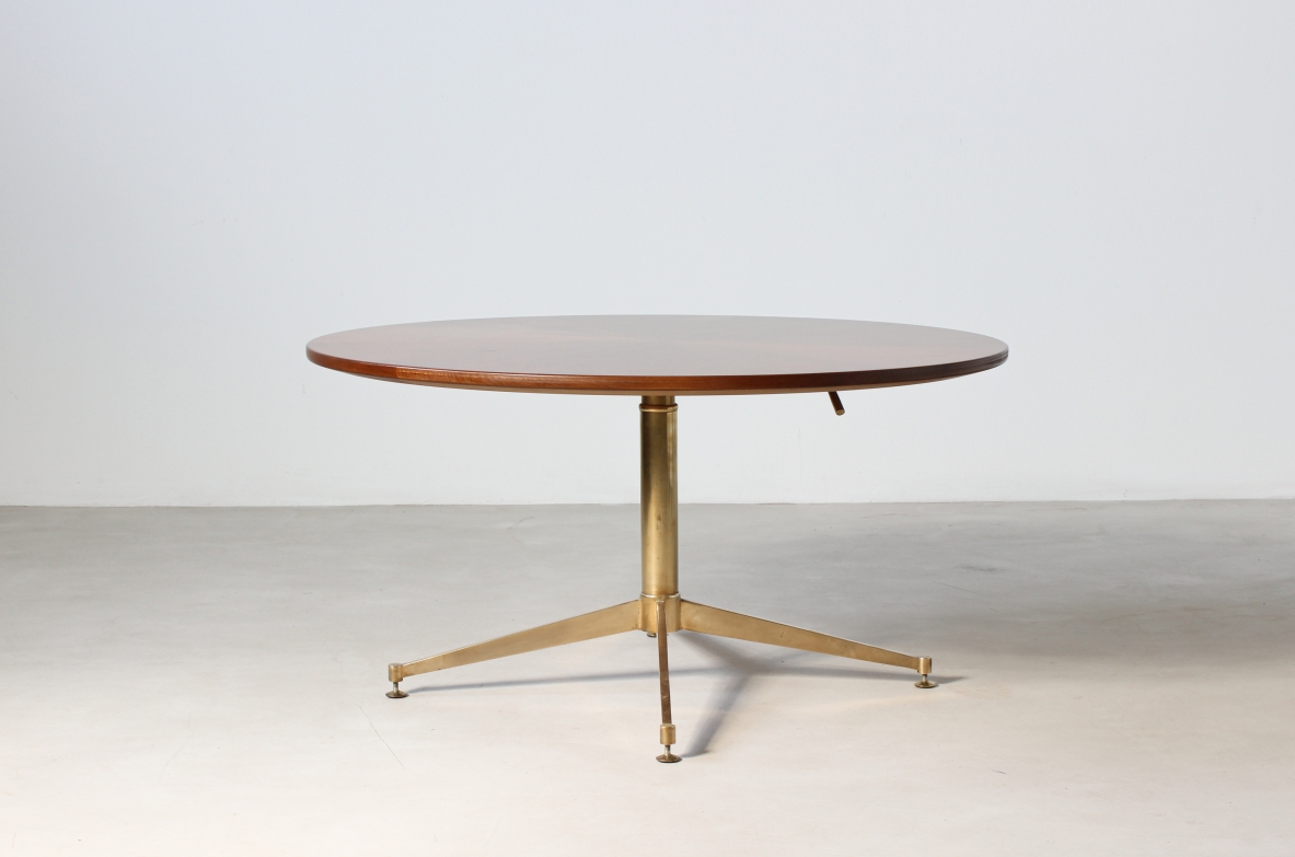 Table with up and down mechanism, brass base and walnut wood top. Italian manufacture, 1950's.