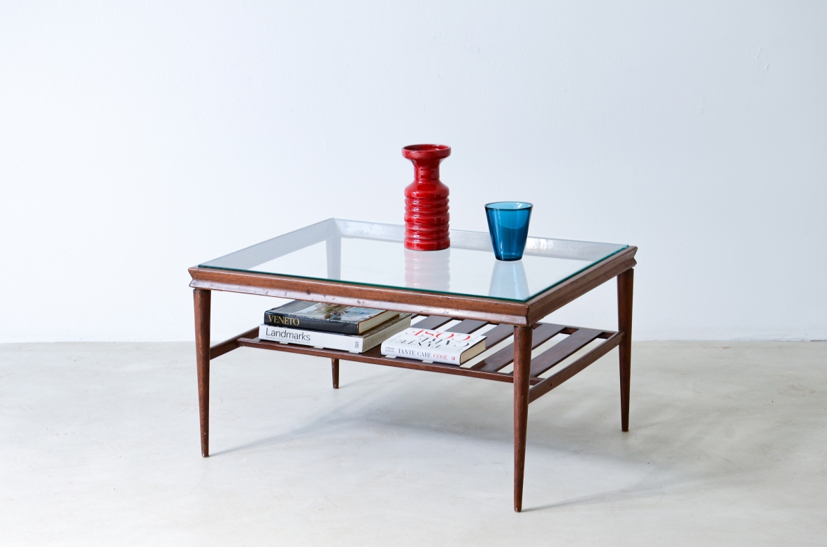 Elegant low table in polished wood with ground glass top and slatted shelf.  Italian manufacture, around 1950.