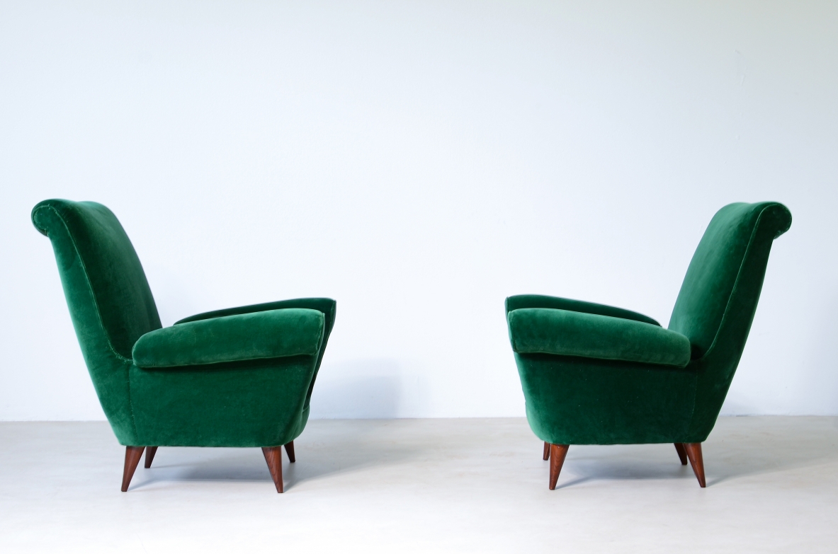 Pair of elegant upholstered velvet high back armchairs.  Italian manufacture around 1950.
