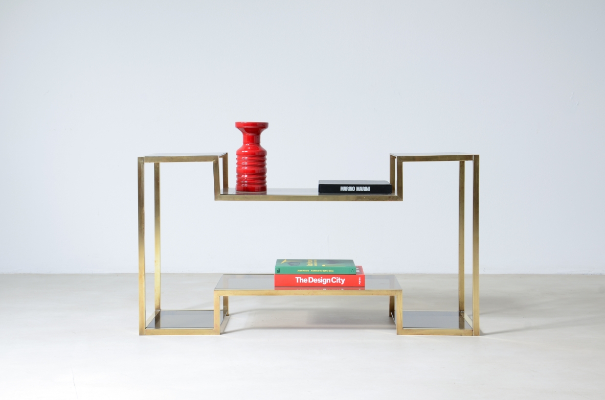 Romeo Rega console table featuring a geometric brass frame with squared lines and two staggered smoked glass shelves.