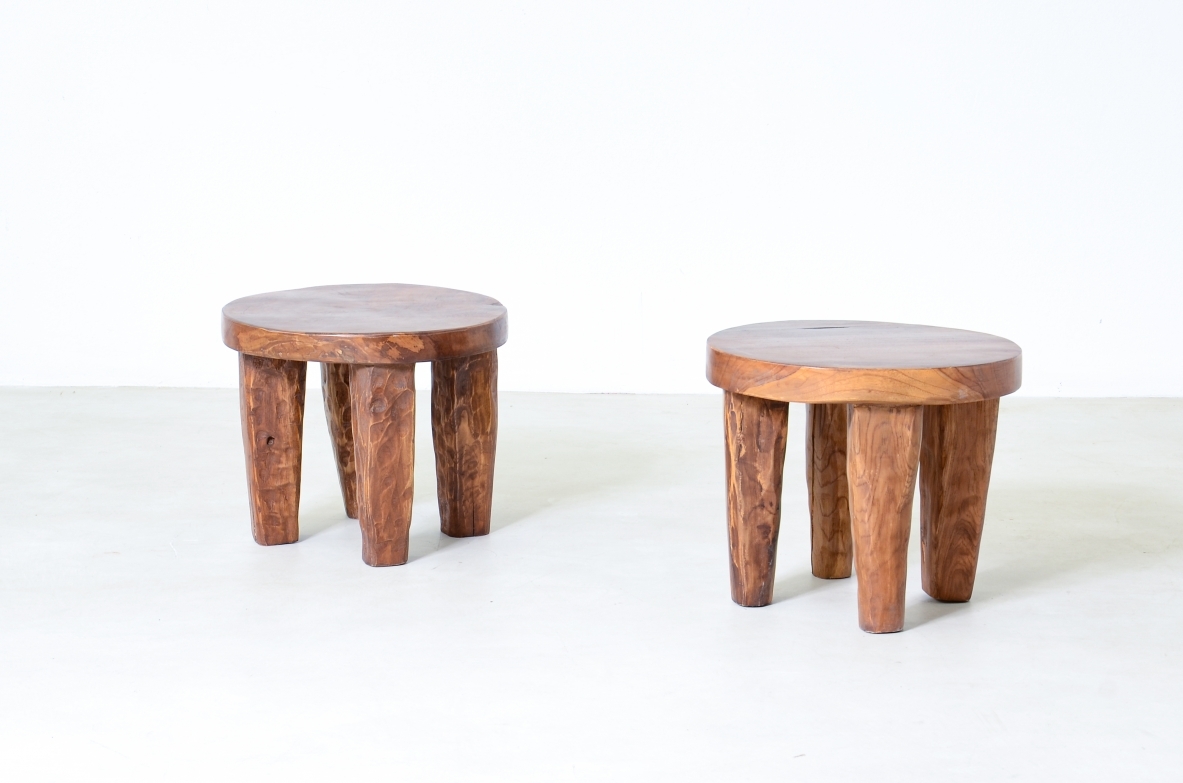 Pair of walnut stools with gouged wooden feet.  Italian manufacture from the 1930s