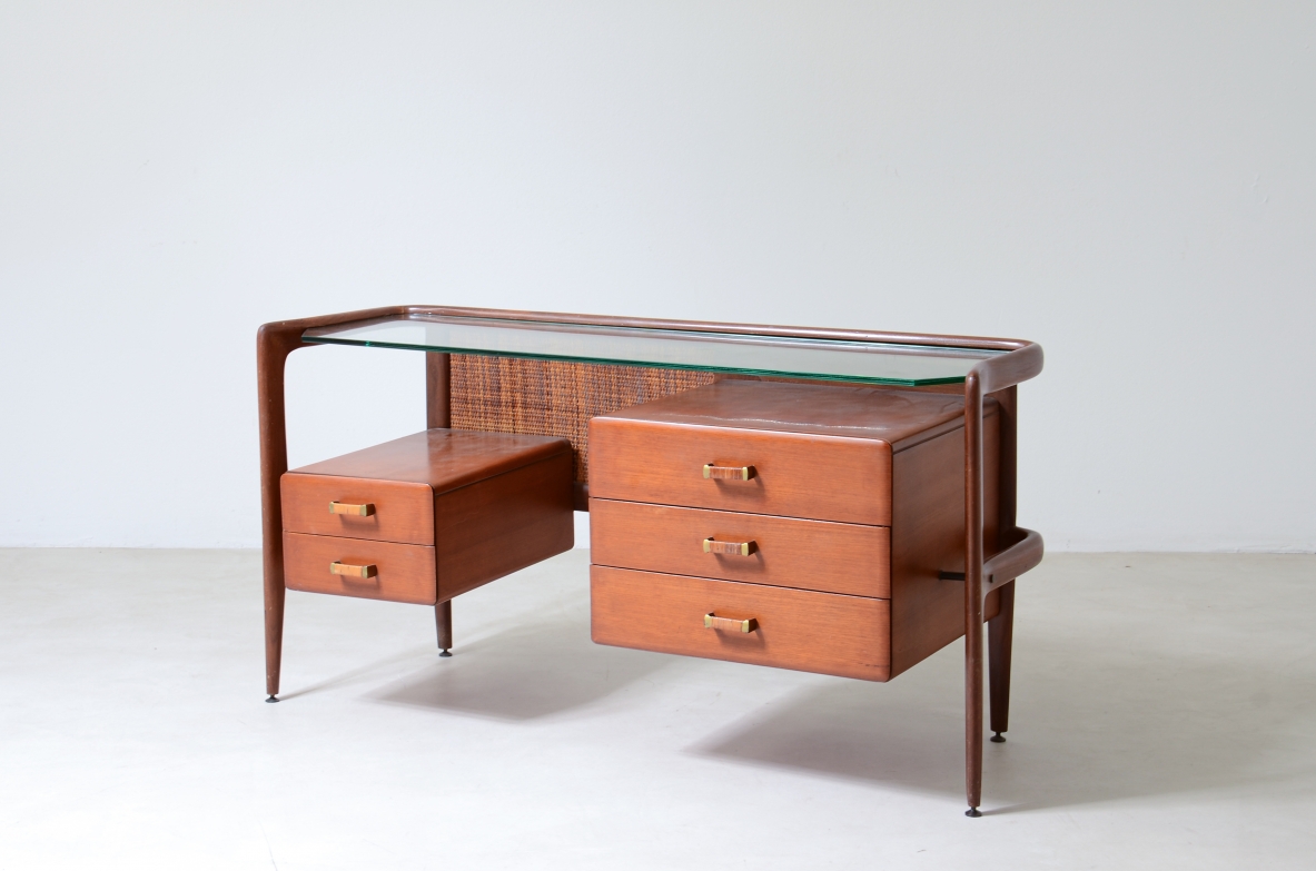 curved wooden console with double row of light wood drawers 1960's manufacturing.